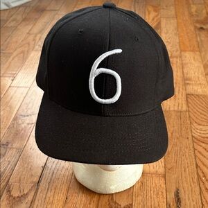October‘s very own OVO Black Baseball Cap with White '6' Embroidered